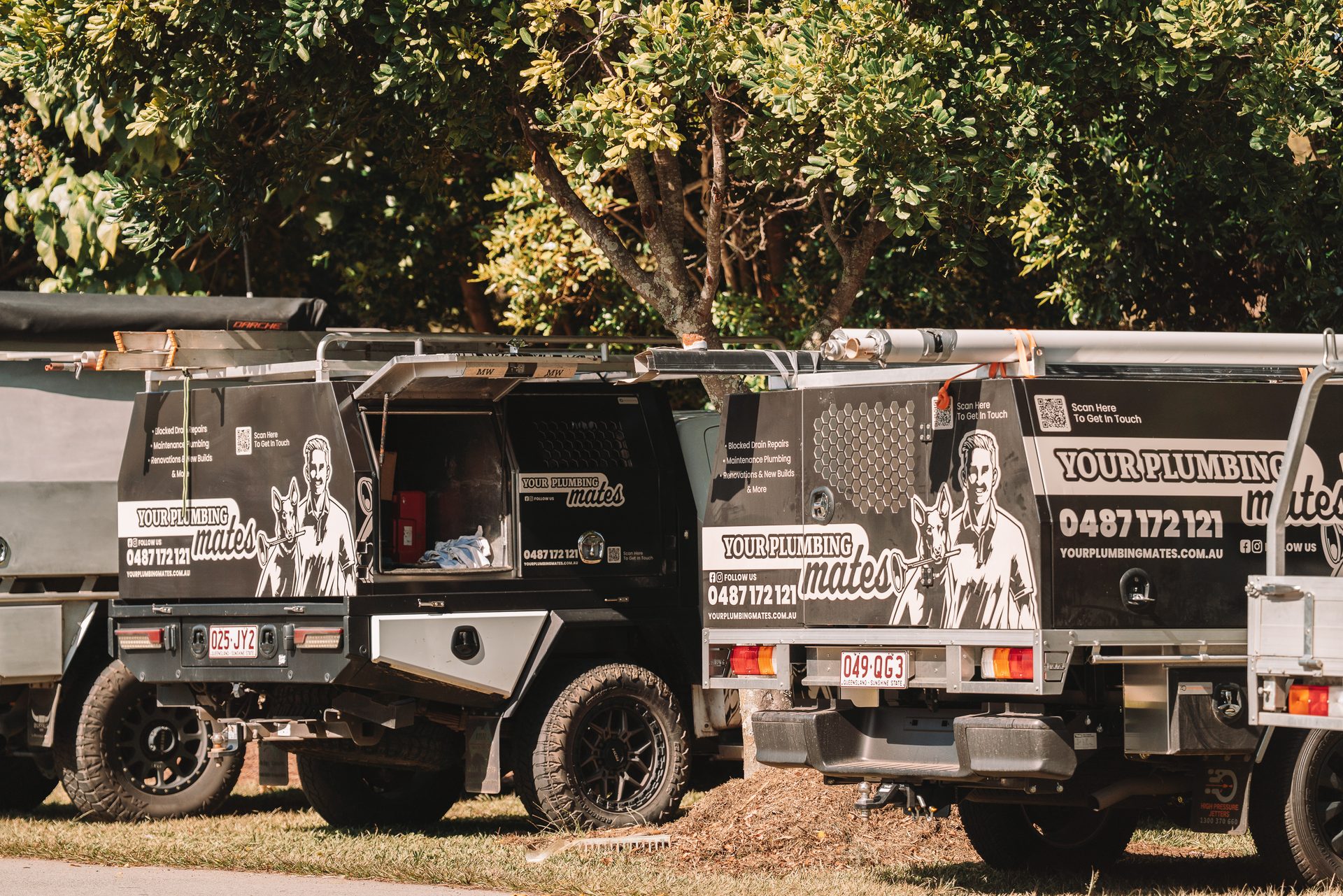 Your Plumbing Mates branded utes on site